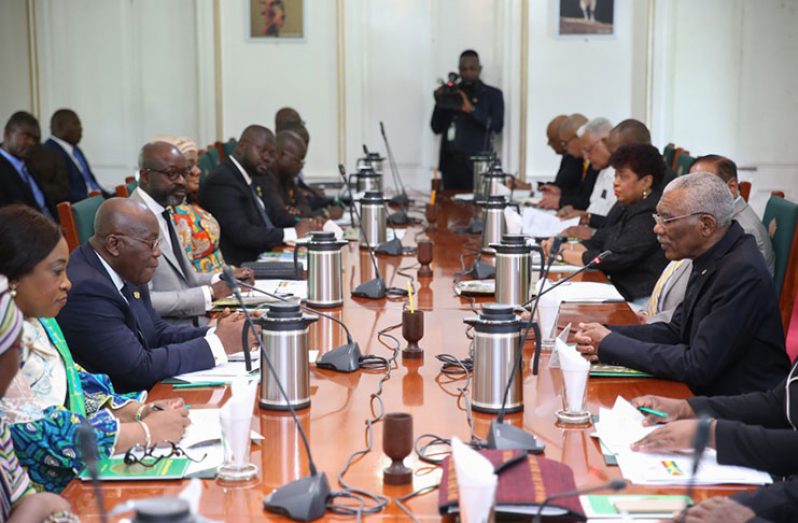 President David Granger and his Ministers of Government engaging in bilateral talks with President Nana Addo Dankwa Akufo-Addo and his delegation during a high-level meeting at State House on Tuesday. (DPI Photo)