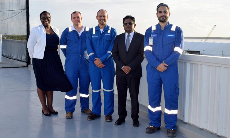 Senior Finance Minister, Dr. Ashni K. Singh with senior officials of Schlumberger Guyana Incorporated