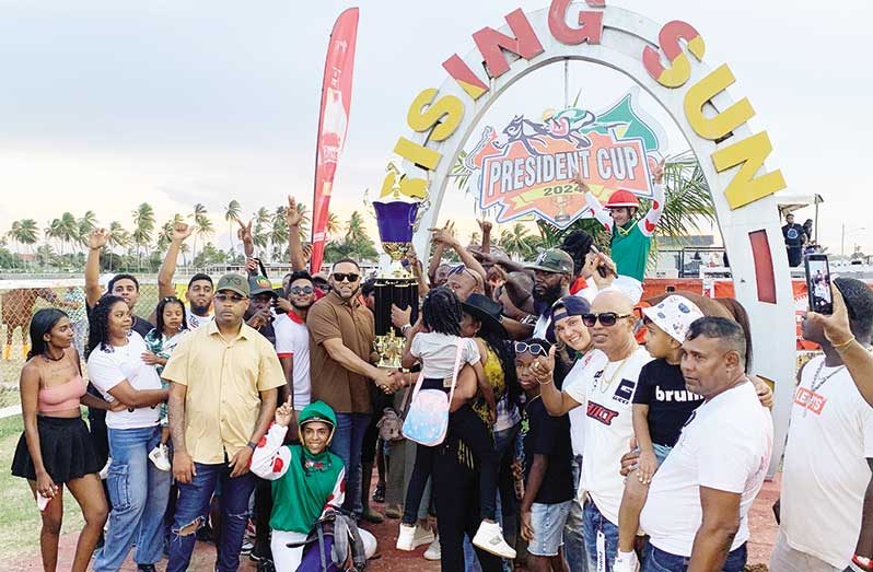 Javid Ali and his Slingerz Racing Stables were jubilant after winning another major title in Guyana’s horse-racing