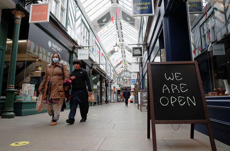 People walking at The Arcade shopping mall on Monday, May 25, 2021, amid the spread of the novel coronavirus disease (COVID-19), in Bedford town centre, in Britain (REUTERS/Paul Childs)