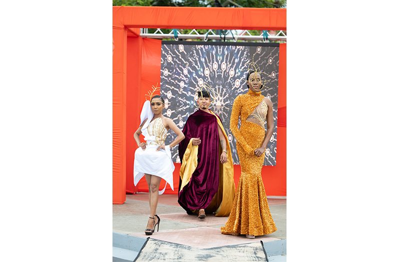 Striking a pose on the Origins runway, more than 60 of Guyana's best models showcase the bold creativity of Guyana’s fashion scene (Guyana Fashion Festival photos )