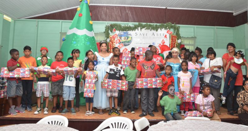 Some of the orphans who received gifts in the presence of Disney characters (Delano Williams Photo)