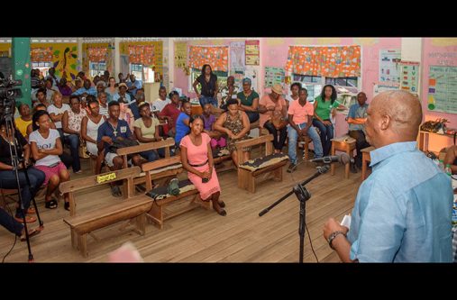 Minister of State, Joseph Harmon, addressing residents at the Den Amstel Primary School (Photos by Samuel Maughn)