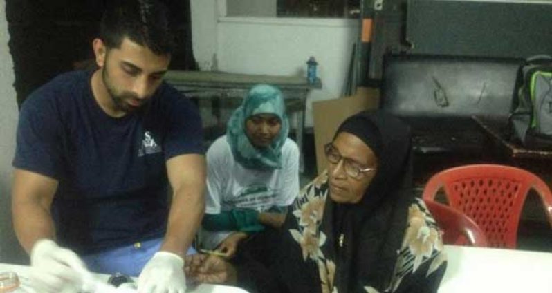 A representative of the Friends of Humanity International group during one of their medical outreach initiatives here