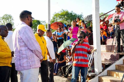 President Dr. Irfaan Ali listens to the concern of one of the many residents at the Silver Hill Community Outreach