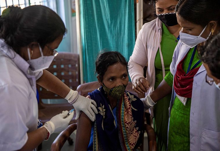 Reena Jani, a health worker, receives the Oxford-AstraZeneca vaccine at
Mathalput Community Health Centre in Koraput, India (Reuters photo)