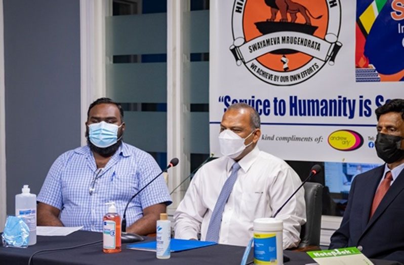 From left to right: Khandai Senanan of the HSS; Health Minister, Dr. Frank Anthony, and HSS Coordinator, Ravi Dev, at the virtual press conference on Monday (DPI photo)