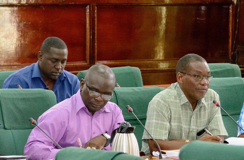At Monday’s PAC meeting are: from left, Permanent Secretary in the Ministry of Communities, Mr Emil McGarrell, and Region One REO, Mr Leslie Wilburg