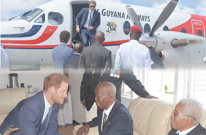 Prince Henry of Wales, KCVO, familiarly
known as Prince Harry, interacts with
Veterans at the Guyana Defence Force’s
(GDF) Camp Ayanganna on Friday.
(Fareeza Haniff photos)