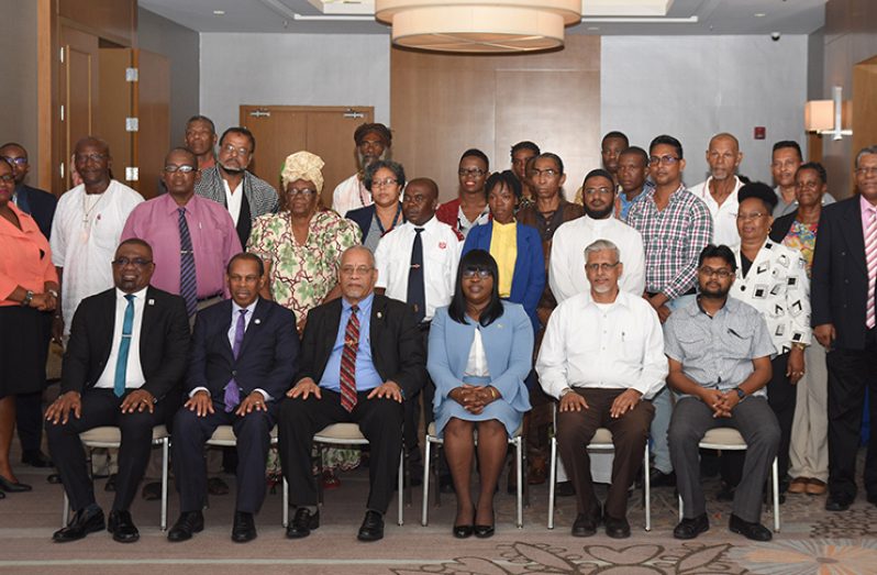 Dr Karen Cummings (seated third right) shares a ‘photo-op’ with several religious leaders and stakeholders of the Guyana National Faith Leaders Consultation (Photo by Samuel Maughn)