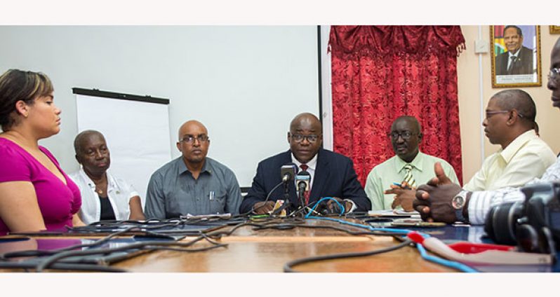 Chief Education Officer, Olato Sam addressing reporters at the Education Ministry in the presence of the Chairman of the Board of Governors of the Brickdam Secondary School, Nicolas Yearwood, President of the Parent-Teachers' Association (PTA), Eric Benjamin and Cheryl Sampson, an advisor to the Ministry.