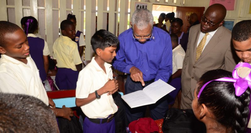 President Granger interacts with a student at President’s College