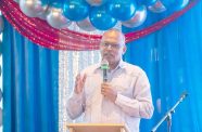 Minister of Health, Dr. Frank Anthony speaking to the graduating class of 128 new Patient Care Assistants (Delano Williams photo)