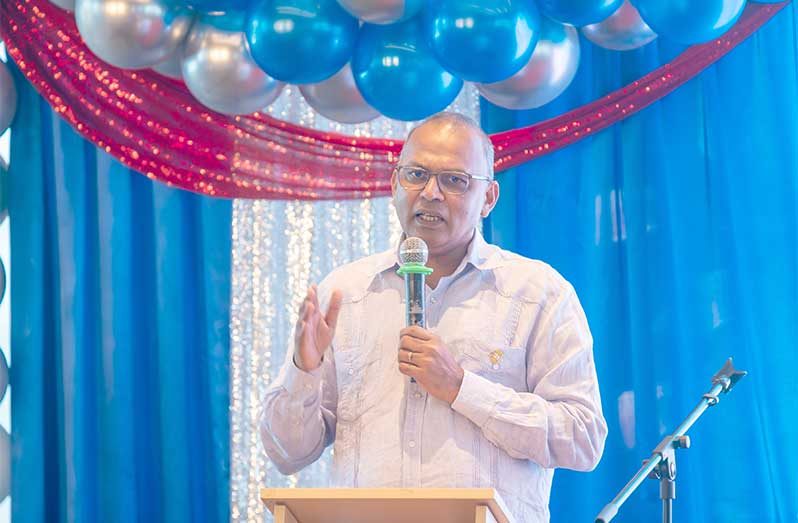Minister of Health, Dr. Frank Anthony speaking to the graduating class of 128 new Patient Care Assistants (Delano Williams photo)