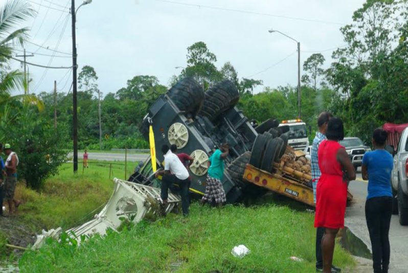 The toppled crane lying at the side of the road at Pearl