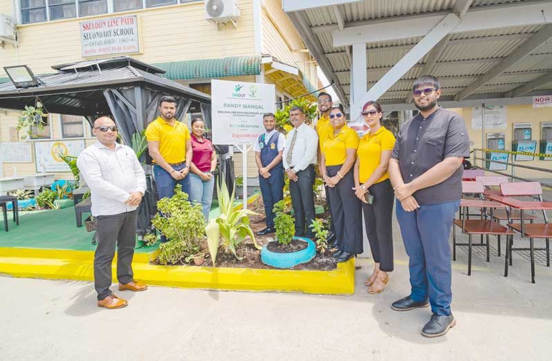 Representatives of Recover Guyana, ExxonMobil Guyana and the Regional Executive Officer for Region Six with SHOUT 2026 winner, Randy Mangal and the Headteacher at the newly launched EcoHub