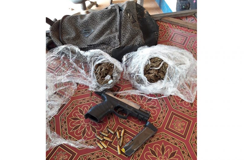 The firearm and ‘weed’ with which the suspect was caught