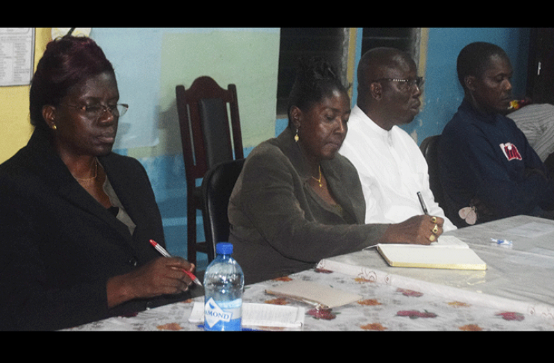 Minister within the Ministry of Agriculture, Valerie Yearwood (centre) flanked by Ms. Delma Nedd, Permanent Secretary Ministry of Agriculture; Mr. George Jervis, head of the ASDU, and Secretary of the Society, Pierre Williams (far right) during the meeting