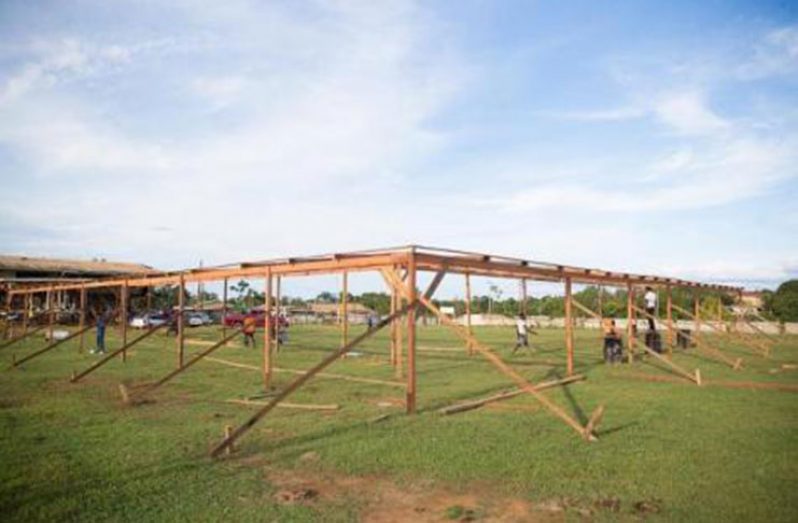 Booths being set up at the Port Kaituma Community Centre Ground for the ‘Government Comes To You’ outreach.
Booths being set up at the Port Kaituma Community Centre Ground for the ‘Government Comes To You’ outreach.