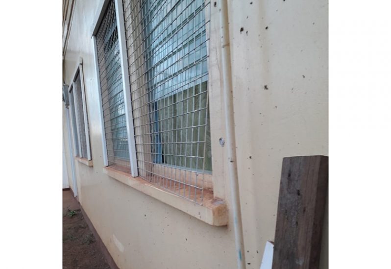 The window that the intruder{s} broke to enter the living quarters of the teachers