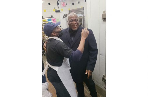 Prime Minister, Brigadier (Ret’d) Mark Phillips, is greeted by a Guyanese living in New York