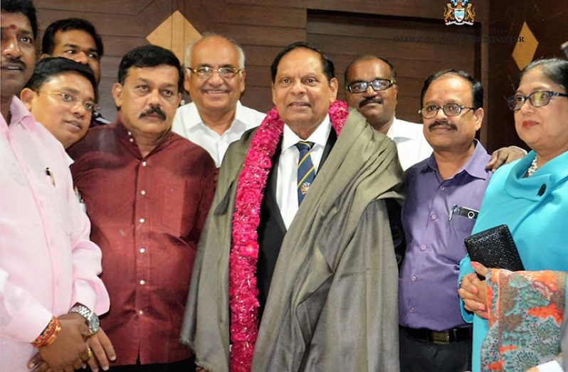 Prime Minister Nagamootoo and Mrs Sita Nagamootoo with members of the Delhi Tamil Advocates Association