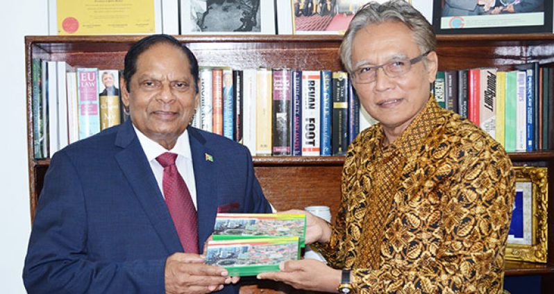 Prime Minister Moses Nagamootoo and Dominicus Supratikto, non-resident Ambassador of the Republic of Indonesia to Guyana