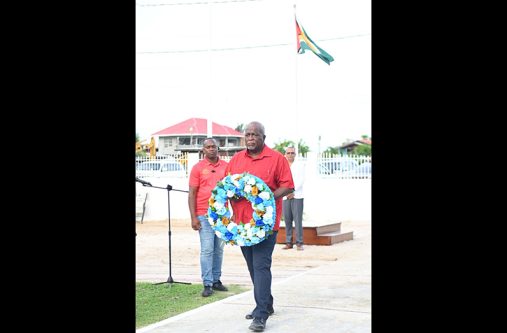 Prime Minister Brigadier (Ret’d) Mark Phillips was among several persons who laid  wreaths at the Enmore Martyrs monument to commemorate their 76th death anniversary (DPI photos)