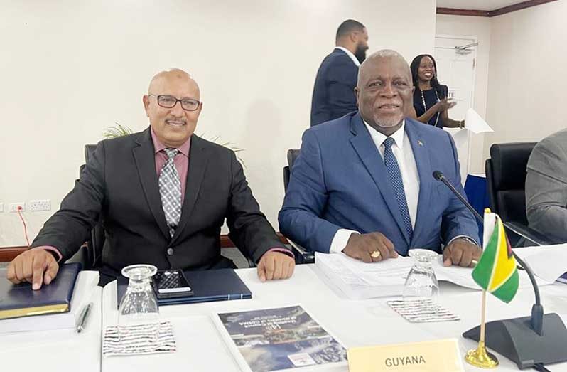 Prime Minister Phillips, responsible for disaster management in Guyana, is accompanied by Colonel (Ret'd) Nazrul Hussain, the Director-General of the Civil Defence Commission