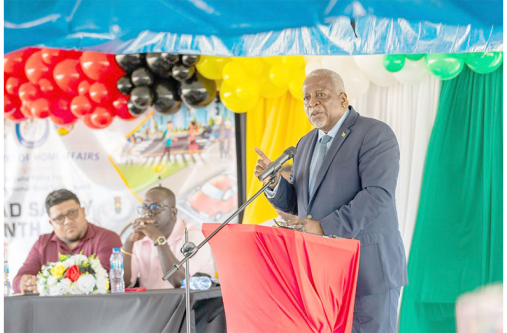Prime Minister, Brigadier (Ret’d) Mark Phillips, performing the functions of President, delivers remarks at the launch of Road Safety Month 2025 held at the Bush Lot Community Centre, Region Five