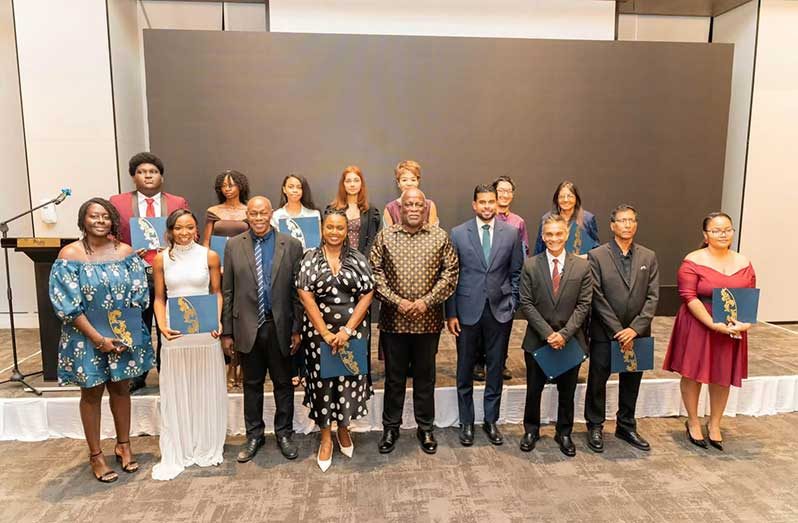 Prime Minister Brigadier (Ret’d) Mark Phillips shares a moment with awardees of the 2025 Guyana Prize for Literature following Friday evening’s award ceremony
