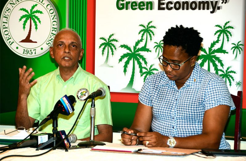 Minister of Communities, and PNC Treasurer, Ronald Bulkan (left); and Minister with responsibility for Housing, Annette Ferguson, at the PNC press briefing on Friday (Adrian Narine photo)
