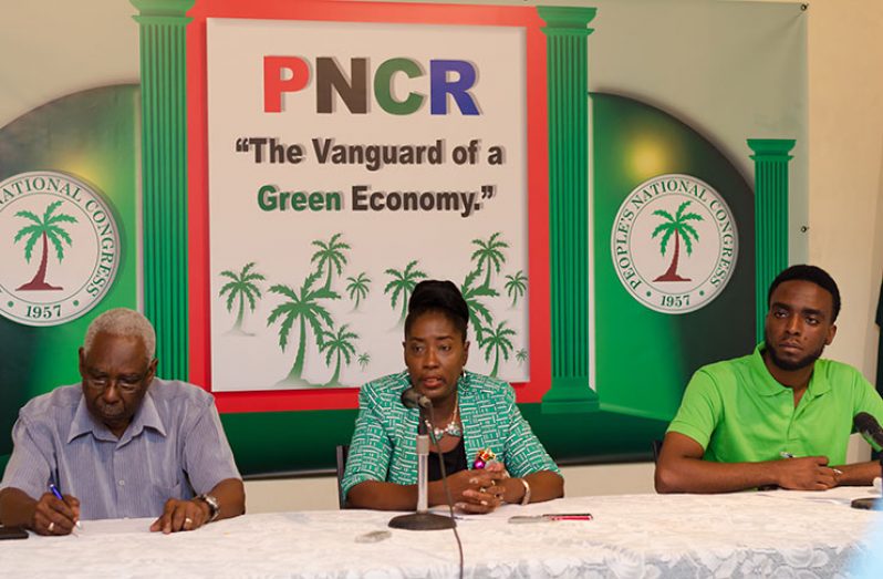 At yesterday’s press conference: Seated, from left, are PNCR General Secretary Mr. Oscar Clarke; Minister within the Ministry of Communities, with responsibility for Housing, Ms Valerie Adams-Patterson; and PNCR youth arm’s National Secretary, Mr. Brian Smith