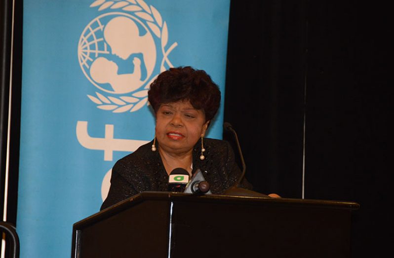 Minster of Social Protection Amna Ally addresses the audience at the launching of the National Policy on Child Labor and National Policy on Occupational Safety and Health (OSH) at the Marriott Hotel on Friday (Adrian Narine photo)