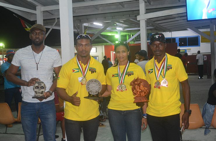 From left, Director of Sport Christopher Jones, Carlos Petterson-Griffith, Nadina Taharally and Franklyn Brisport Luke.