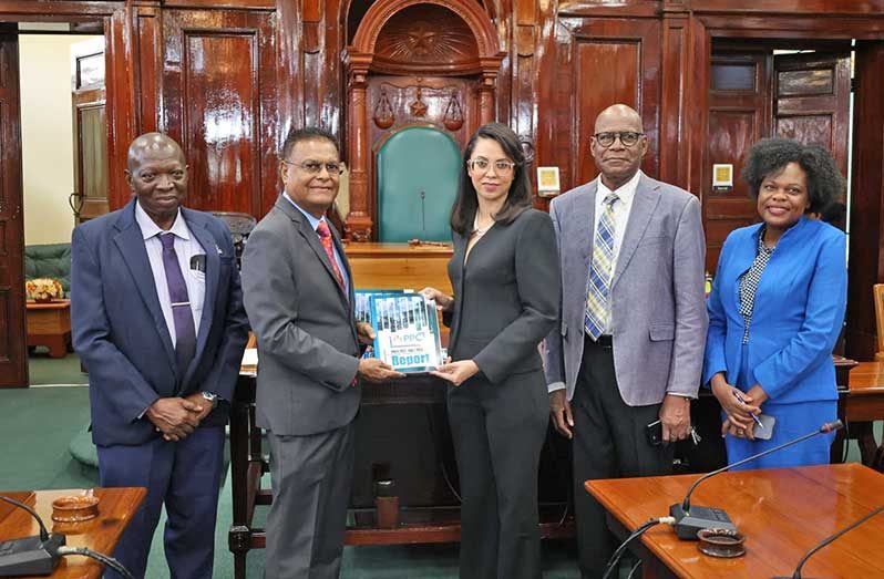 Chairman of the PPC, Pauline Chase handing over the Annual Report for the year 2022-2023 to the Speaker of the National Assembly, Manzoor Nadir in the presence of other officials  