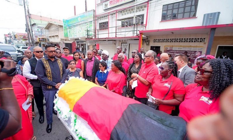 President, Dr. Irfaan Ali, and other representatives of the PPP/C pay tribute to the late Philomena Sahoye-Shury