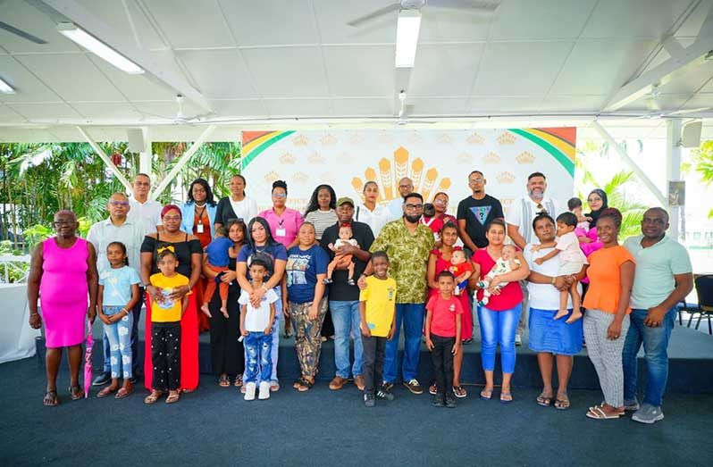 President Dr Irfaan Ali joins parents, children and members of the medical team following an engagement with families whose children are scheduled to undergo specialised cardiac surgeries in Guyana between September 28 and October 2. Seventeen children with congenital heart defects are expected to benefit from the life-saving procedures