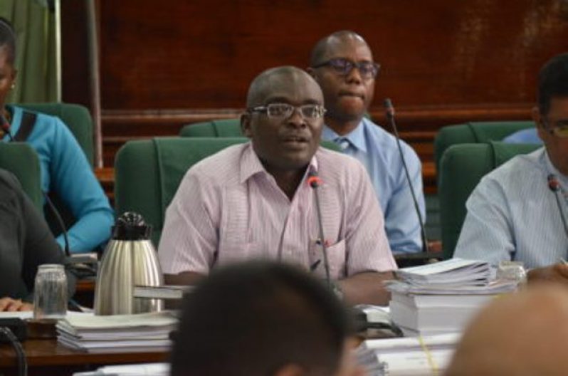 Permanent Secretary (PS) Emil McGarrel appearing before the Public Accounts Committee (PAC)