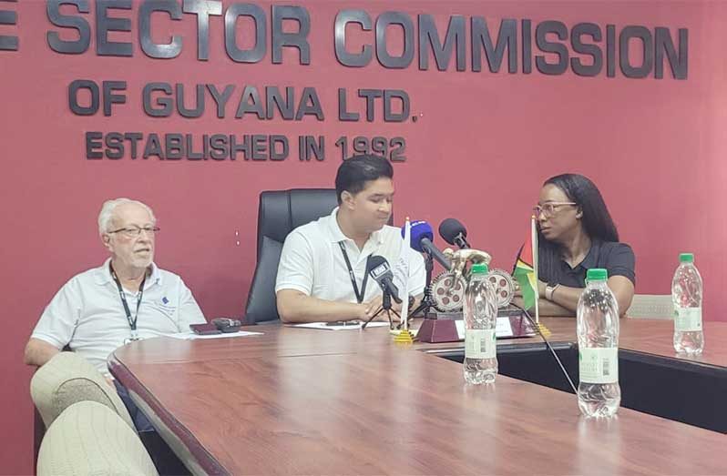 PSC Chairman Gerald Gouveia Jr., (centre) accompanied by Vice-Chairman Kathy Smith and Executive Committee member Christopher “Kit” Nascimento