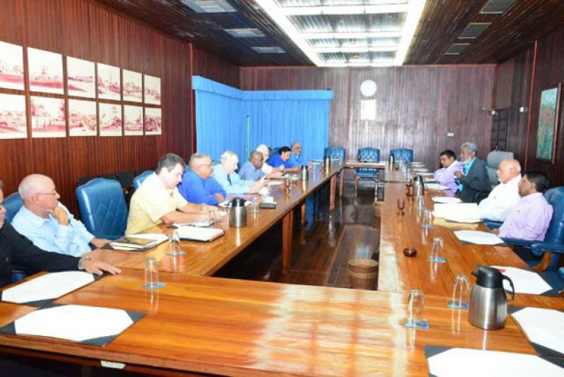 President Donald Ramotar during a meeting with members of the PSC at the Office of the President on Monday. Also in photo are Head of the Presidential Secretariat, Dr. Roger Luncheon, Minister of Finance, Dr. Ashni Singh, and Minister of Tourism, Industry and Commerce (ag) Irfaan Ali. (GINA photo)