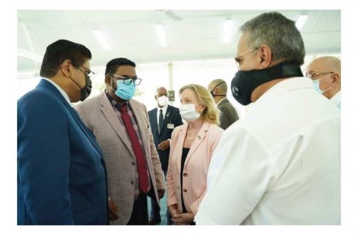 Chairman of the Private Sector Commission (PSC), Gerry Gouveia, in discussion with President of Guyana, Dr. Irfaan Ali; President of Suriname, Chandrikapersad Santokhi; and US Ambassador, Sarah-Ann Lynch, on Sunday