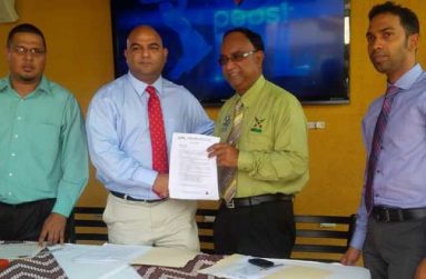 Sealed deal! Palm Court Managing Director Ravindra Prashad and Limacol CPL OPCO (Guyana) Inc. Operations Manager, Omar Khan confirmed the agreement. Sharing the moment are Palm Court General Manager Avalon Jagnandan (left) and NEW GPC Marketing Manager Trevor Bassoo. (Photo: Rajiv Bisnauth)