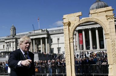 London Mayor Boris Johnson speaks at the unveiling of a 5.5-meter (20ft) recreation of the 1,800-year-old Arch of Triumph in Palmyra, Syria, at Trafalgar Square in London, Britain April 19, 2016. (REUTERS/Stefan Wermuth)