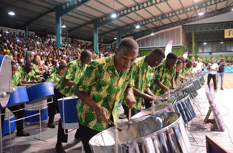 The Guyana Police Force Band playing their tribute [Samuel Maughn photo]
