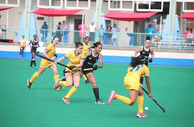 flashback- Guyana's Women's team battling Brazil in the Pan American Challenge Series last year