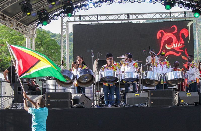 Members of the National Steel Orchestra performing at the CARIFESTA Grand Market on Sunday at the Queen's Park Savannah in Trinidad
