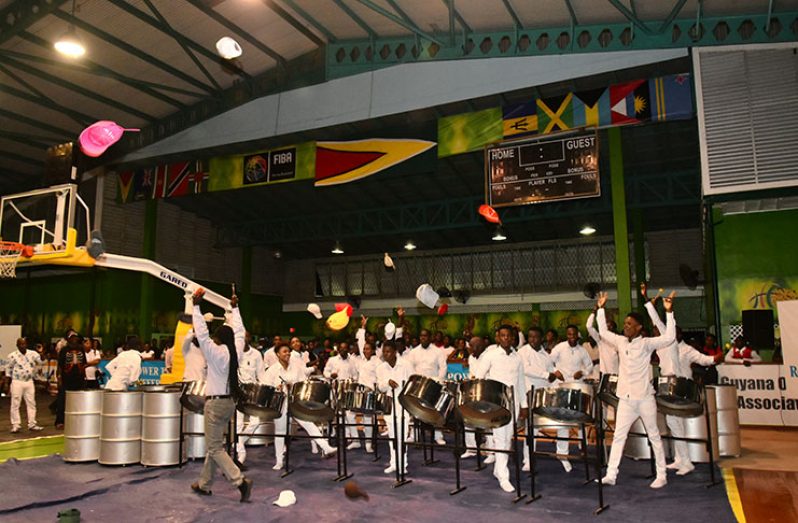 The National School of Music steel orchestra playing a piece after their win