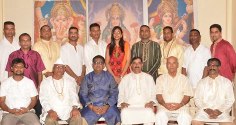 Some of the pandits supporting November 10 as the day Deepawali should be celebrated. In photo (back row) from left standing are Pandit Krishna Patiram, Pandit Sodama Maraj, Pandit Vijay Doobay, Pandit Hardesh Tiwari, Pandit Dhanesh Prashad, Bahinji Devica Uditram, Pandit Gopi Prashad, Pandit Maheshwar Maraj, Pandit Bhagwandin (Dado), and Pandit  Aditya Persaud. In from row from left sitting are Pandit Ubraj Narine, Pandit Somnauth Sharma, Pandit Rudra Sharma, Pandit Rabindranath Persaud, Pandit Balbadar and Pandit Maneshwar Sawh