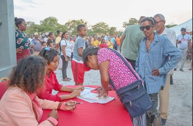 Residents during the solar panel and accessories distribution